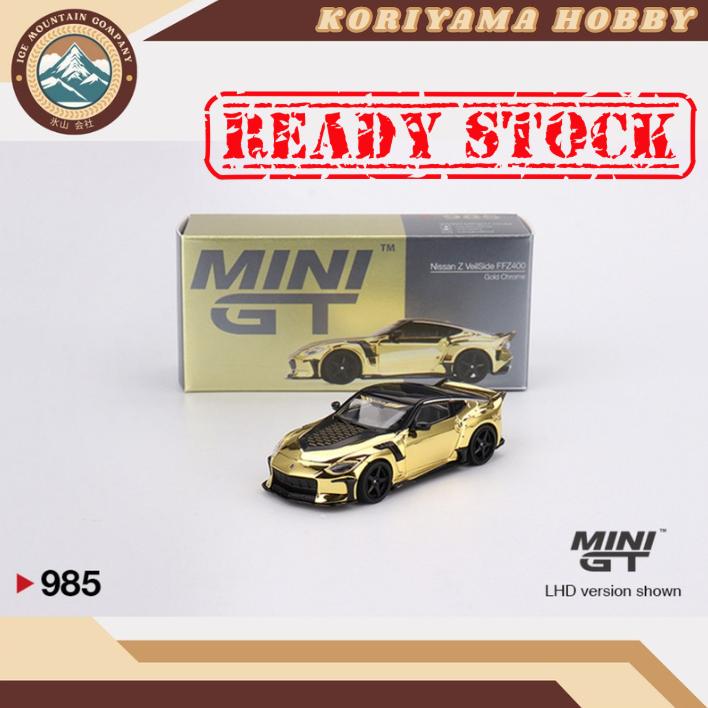 Mini GT 985 Nissan Z VeilSide FZ400 Gold Chrome MiniGT